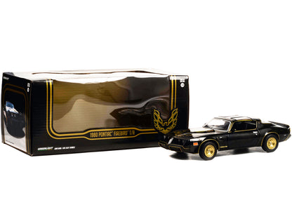 1980 Pontiac Firebird Trans Am T/A Turbo 4.9L Starlite Black with Golden Eagle Hood and Stripes 1/24 Diecast Model Car by Greenlight